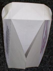 Rotate and insert tabs into pockets.